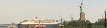 Queen Mary 2 passing Lady Liberty